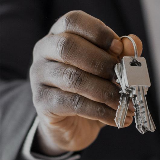 hand holding keys Macdonald & Sager LLP FAMILY & CRIMINAL LAW