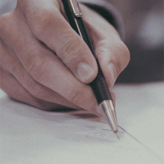 hand pen writing paper Macdonald & Sager LLP Commercial & Property Law