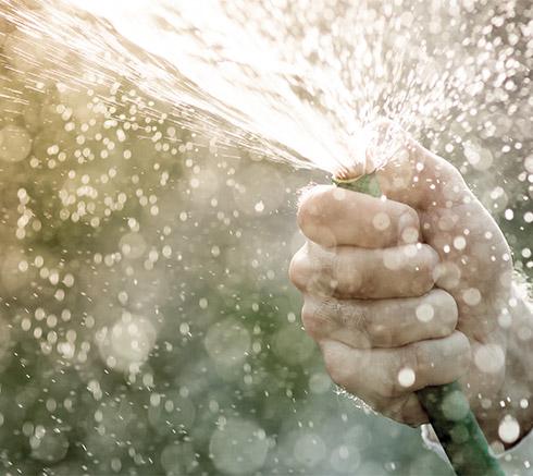 hose with thumb over it